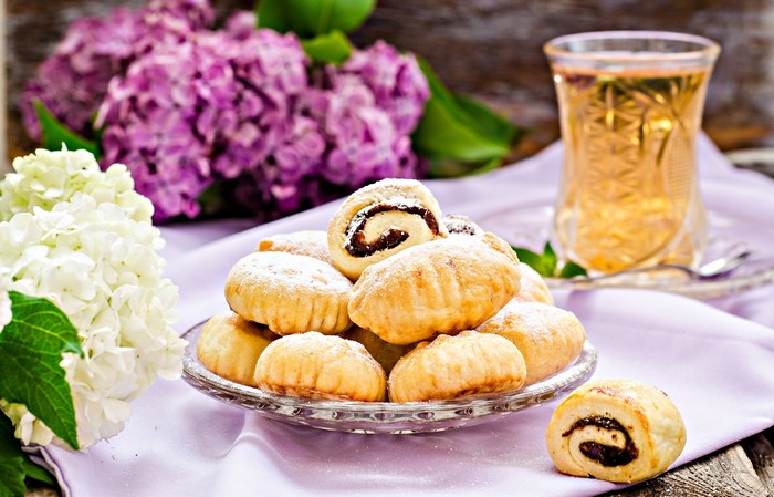 Pastries with tea and hydrangeas