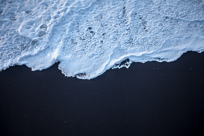 Foam on Black Sand Beach