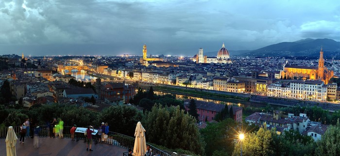 Florence cityscape at dusk with Arno River and bridges