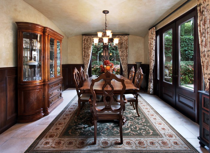 Dining Room with Chandelier and Carpet