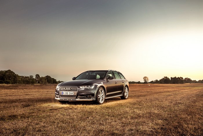 Audi A6 Allroad TDI quattro in a field