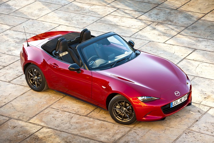 Red Mazda MX-5 Convertible on Paved Surface