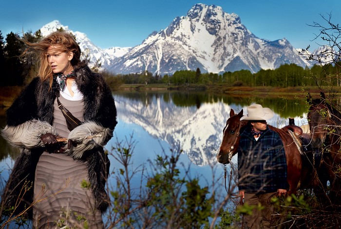 Blake Lively and cowboy with horses by lake and mountains
