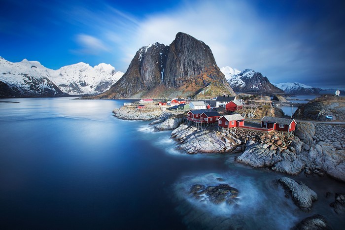 Hamnøy village with snow-capped mountains in Norway