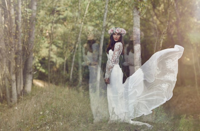 Bride with flower crown in a forest