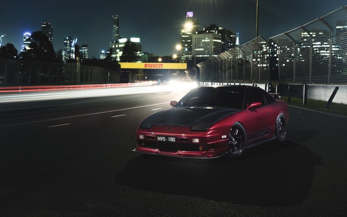 Nissan 180sx at Night with City Skyline