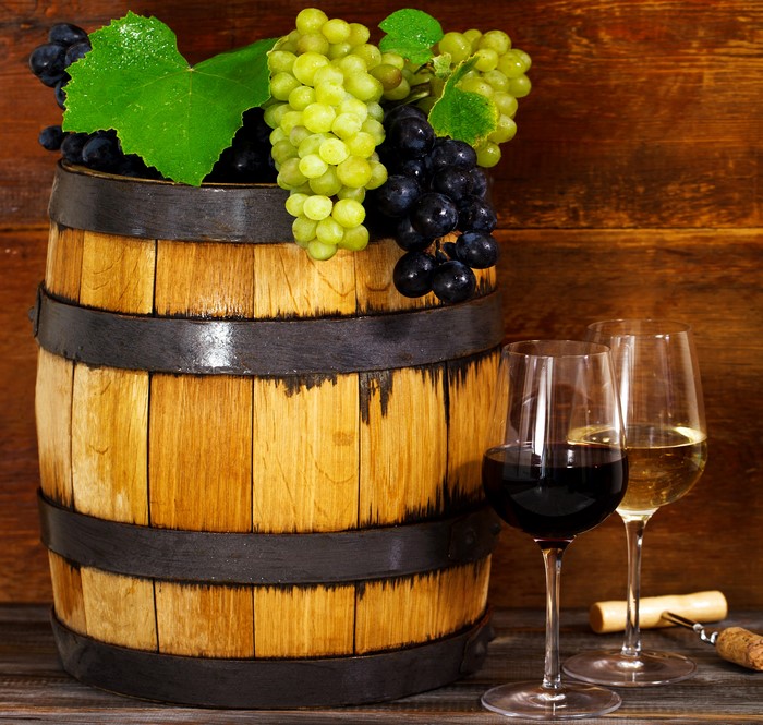Barrel with Grapes and Wine Glasses