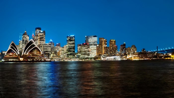 Sydney Opera House and skyline at night