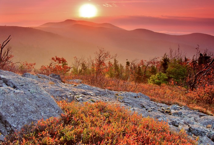 Mountain landscape at sunset with autumn foliage