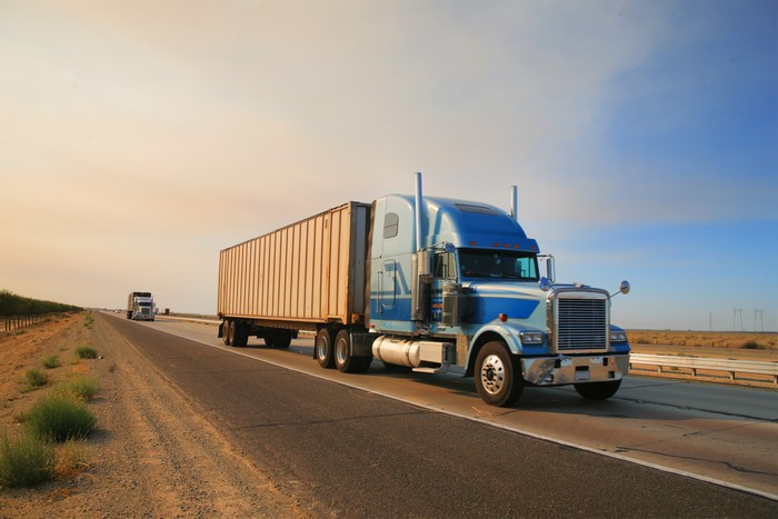 4K Blue Peterbilt Truck on Road