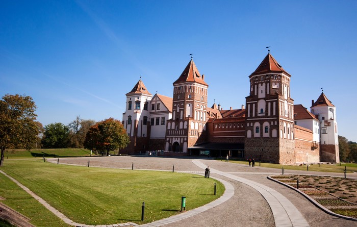 Mir Castle Complex in Belarus under a clear blue sky