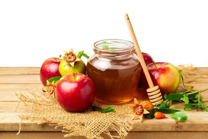 Apples and Honey in a Jar with Honey Dipper