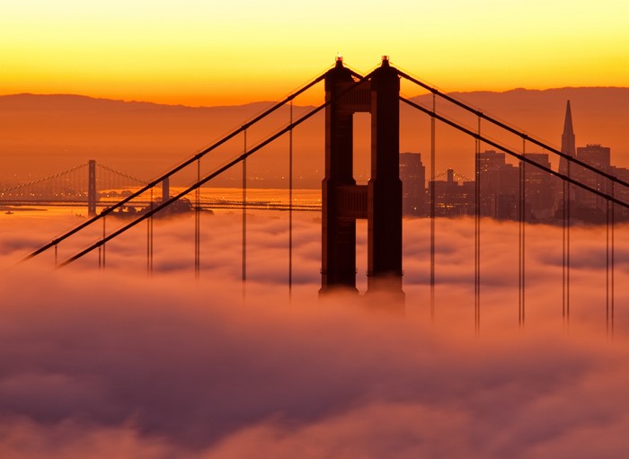 Golden Gate Bridge and San Francisco skyline in fog