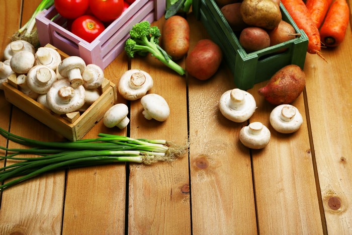 Vegetables and Mushrooms on Wood Planks