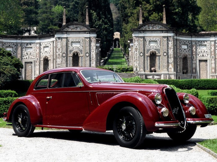 Red Alfa Romeo 8C 2900B Coupe in front of Villa Melzi Gardens