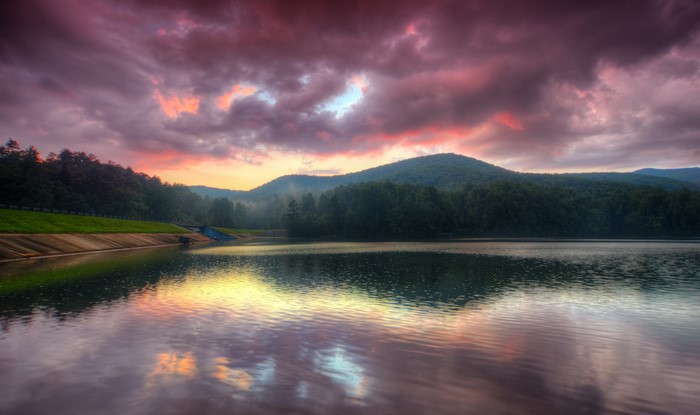 Lake and Mountains at Sunset with Fog