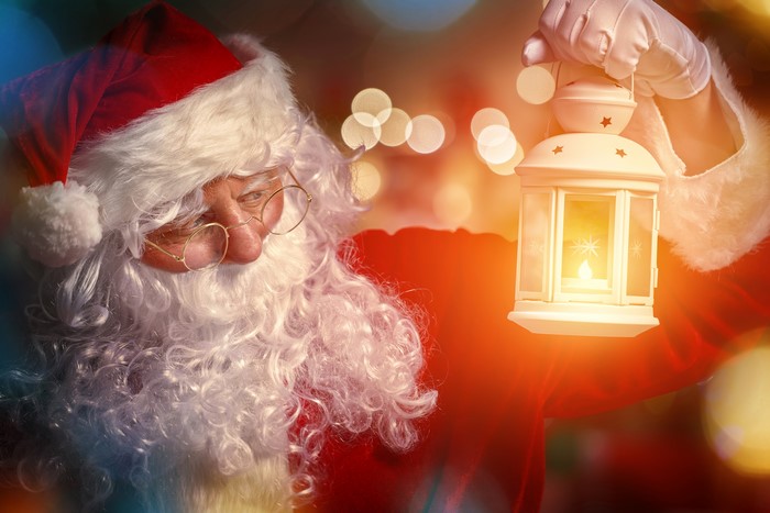 Santa Claus holding a lantern