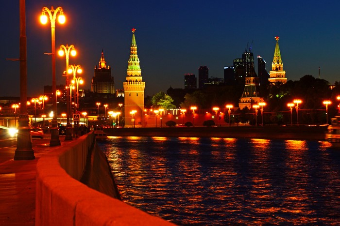 Moscow Kremlin towers and river at night