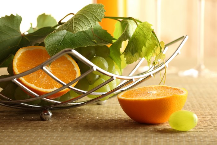 Oranges and Grapes in a Fruit Basket