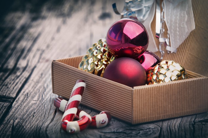 Christmas ornaments and candy canes in a box