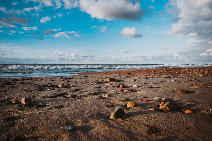 Beach with stones and waves on the Baltic Sea