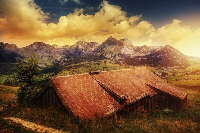 Wild House with Mountains and Clouds