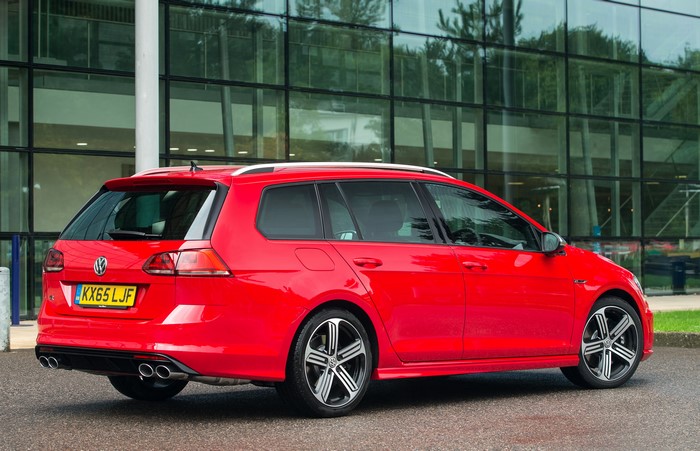 Red Volkswagen Golf VII R Estate from behind