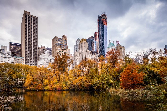 New York City Skyline in Autumn from Central Park Pond