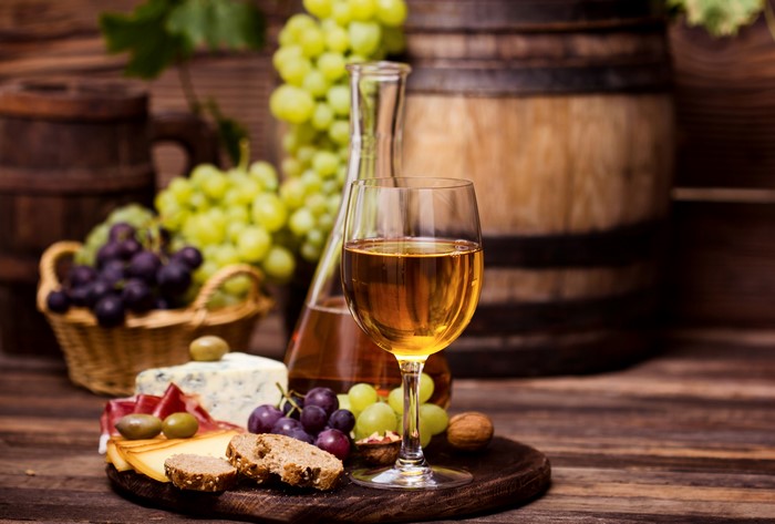 Wine, Grapes, Cheese, and Barrel