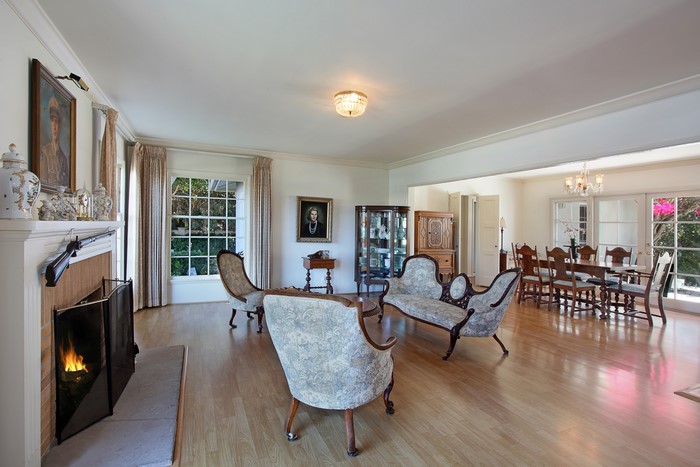 Living room with fireplace and dining area