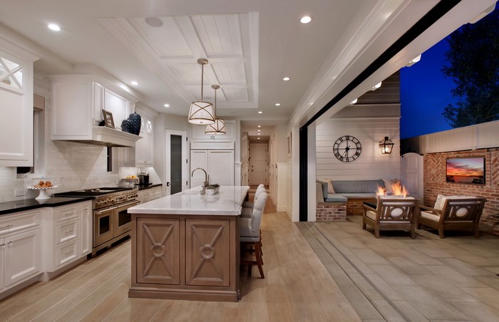 Kitchen and outdoor living area with fireplace