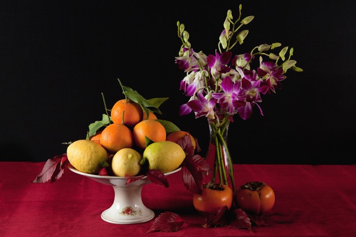 Still-life with fruit, flowers, and persimmons