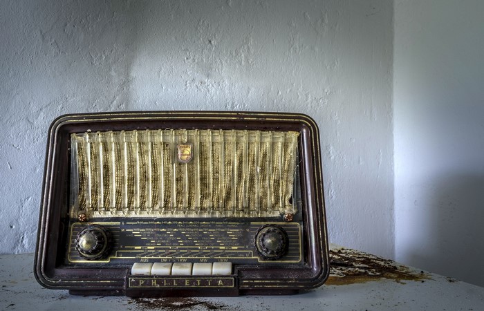 Vintage Philco radio on a dusty surface