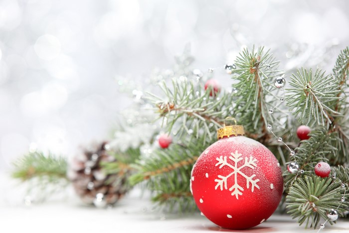 Christmas Ornament on Pine Branches with Snow