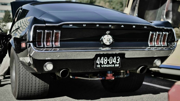 Black 1968 Ford Mustang rear view