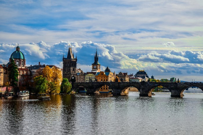 Charles Bridge and Prague skyline over Vltava River
