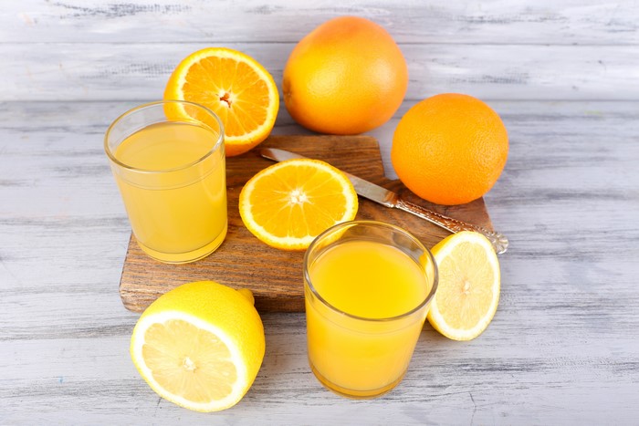 Oranges, Lemons, and Juice in Glasses