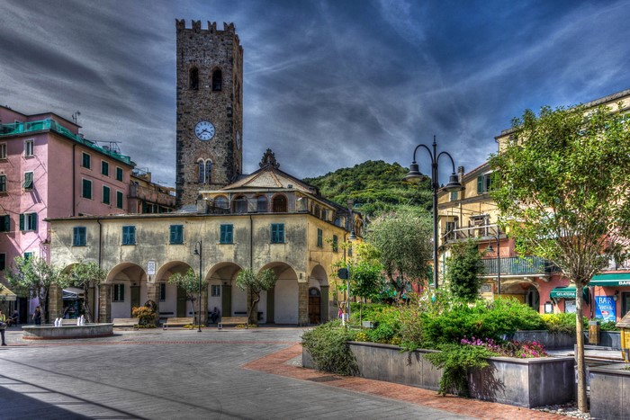 Monterosso, Italy square with clock tower and buildings