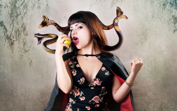 Woman with snakes and apple
