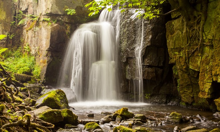 4K Serene Waterfall with Mossy Stones