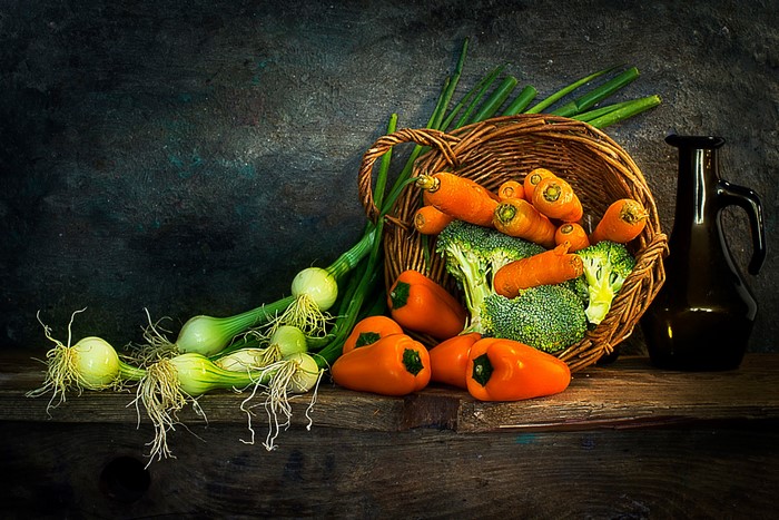 Still life of fresh vegetables in a basket