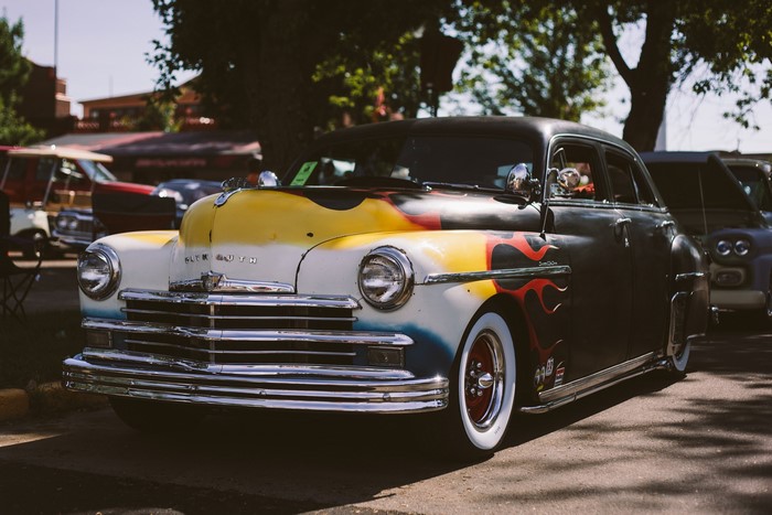 Retro Plymouth car with flame paint