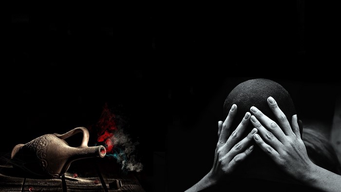 Man covering face near ancient jug with smoke