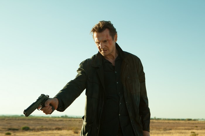Liam Neeson with a pistol in Taken 3