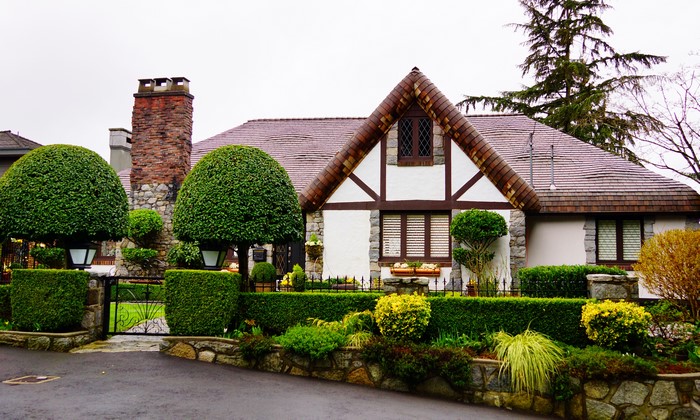 Tudor-style house with manicured landscaping in Vancouver