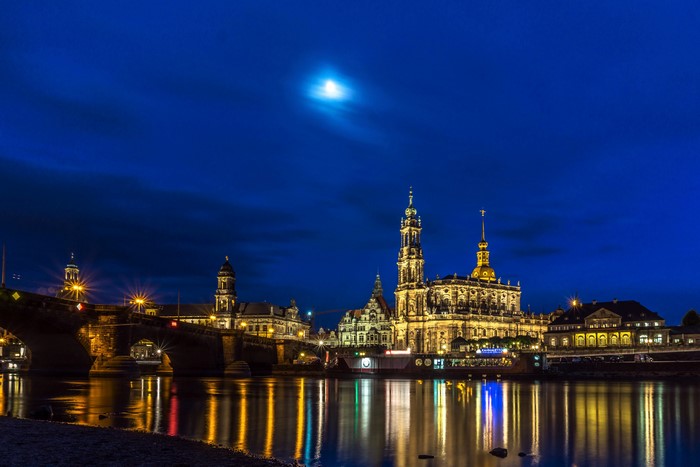 Dresden skyline at night with Elbe river and bridge