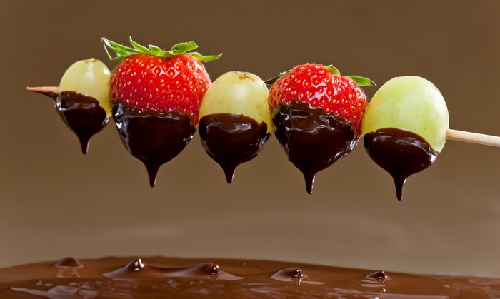 Strawberries and grapes dipped in chocolate