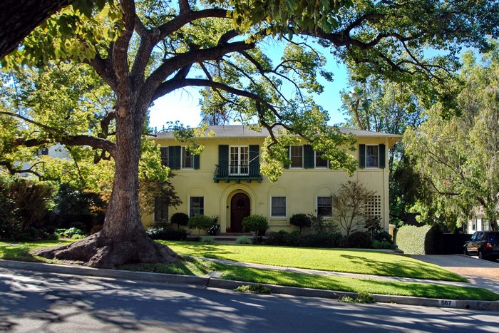 Yellow house with large tree in Pasadena, California