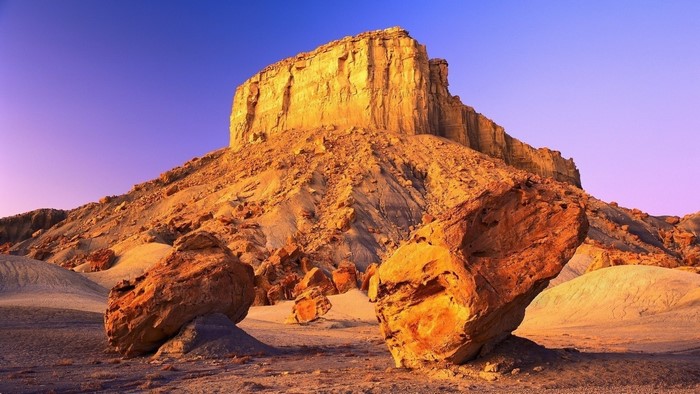 Desert landscape with rock formations and mesa