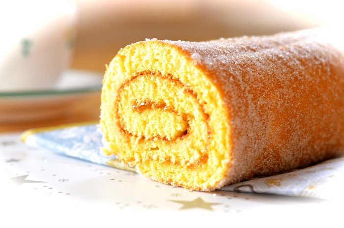 Swiss roll cake with sugar coating
